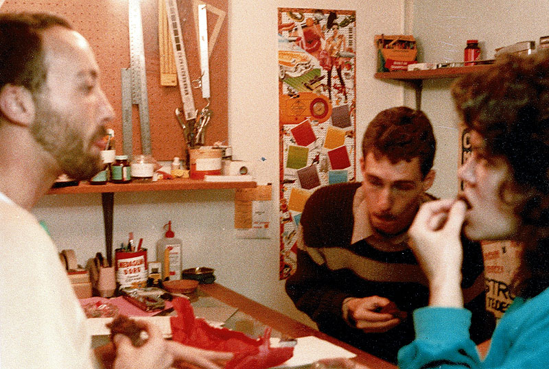 File:Will-Roscoe-and-Brad-Rose-and-Caitlin-Manning-at-layout-table-in-460-Ashbury-c-1984.jpg