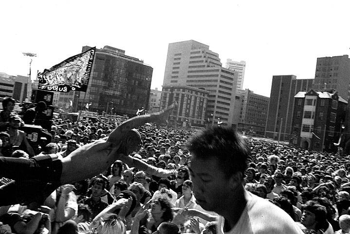 July-1984-stage-diver-at-rock-against-racism-concert-in-front-of-Democratic-Convention.jpg