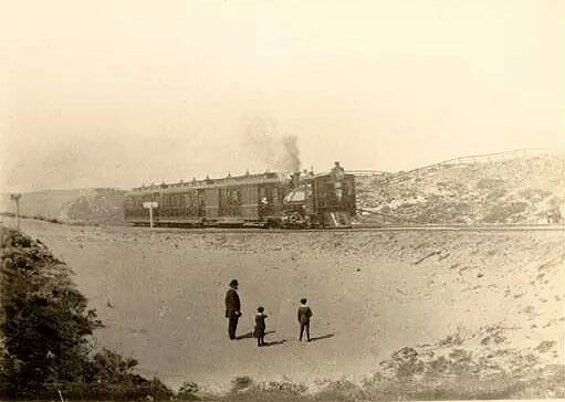 Steam-dummy-on-ferry-and-cliff-house-line-6th-and-California-c-1890.jpg