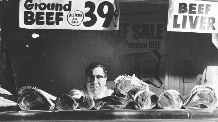 Emmett Rose and his meat counter 1954 AAC-6870.jpeg