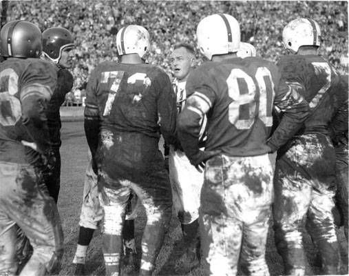 Umpire Bill Fischer talking to players during a football game at Kezar Stadium jan 2 1949 AAC-5279.jpg