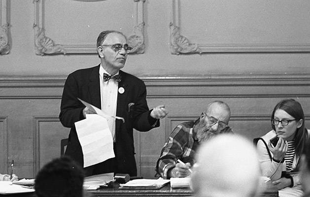George Woolf (center) on panel at a meeting of Tenants and Owners in Opposition to Redevelopment (TOOR) at Milner Hotel, 117 4th Street Dec 1970 TOR-0135.jpg