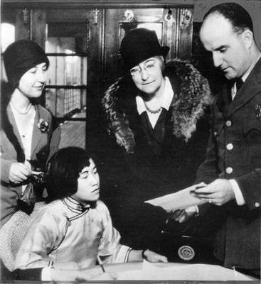 Donaldina Cameron with author Carol Green Wilson, immigration inspector J. R. McGrath, and Choie Lee Nov 6 1931 AAD-0614.jpg