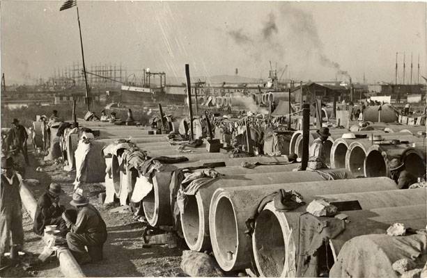 Water pipes used as shelter by jobless people 1932 AAK-0435.jpg