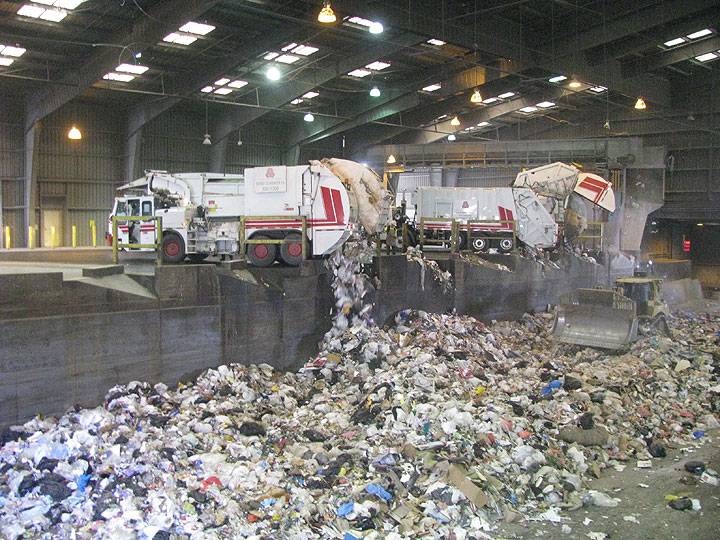 File:Trucks-dumping-at-transfer-station 6818.jpg