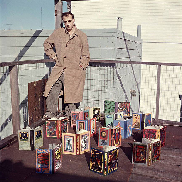 File:2 Kenneth-Patchen-in-1957-with-a-collection-of-his-painted-books.-The-photograph-was-taken-by-the-late-photographer-Harry-Redl-on-the-rooftop-of-his-apartment-house-in-San-Francisco.jpg