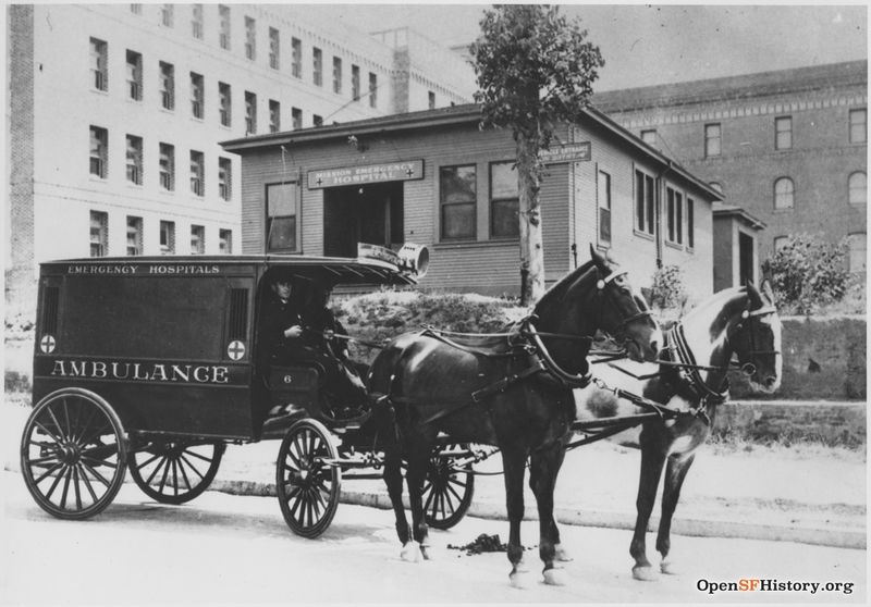 C 1920s Horse drawn ambulance with driver and attendant in front of Mission Emergency Hospital on 23rd Street wnp70.0312.jpg