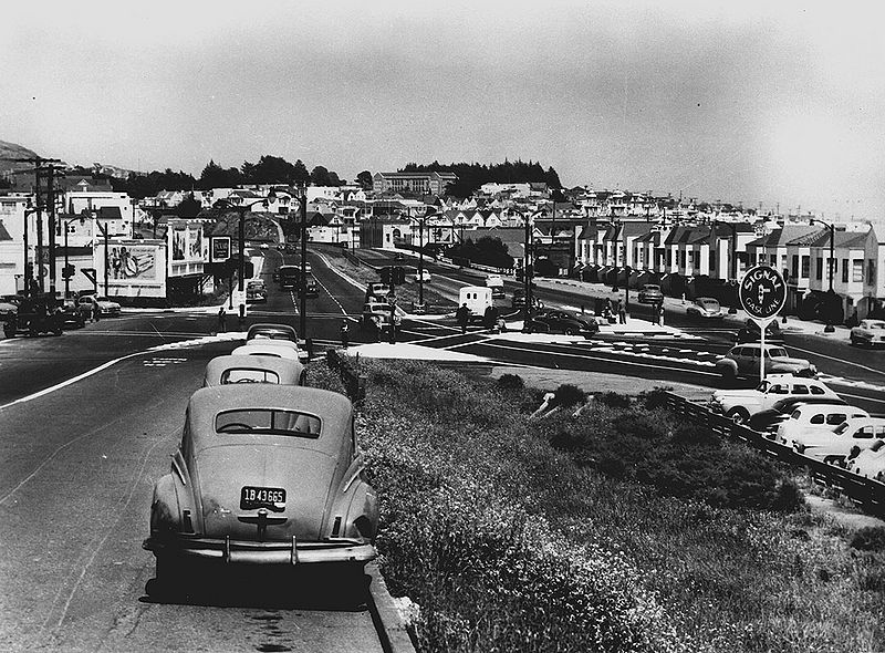 File:Monterey-Blvd-northeast-at-San-Jose-w-Diamond-at-left-and-Holly-Park-in-distant-center--largebldg-is-Junipero-Serra-Grammar-School-June-1953-SFDPT.jpg