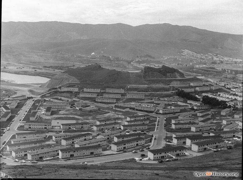 1953 view from Bayview Hill View Southwest toward San Bruno Mountain, showing Candlestick Cove housing projects and excavation of the hill where Recology now sits. Little Hollywood and Visitacion Valley at right opens.jpg
