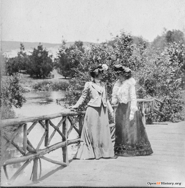 File:North Lake, Chain of Lakes, Rustic Bridge, Two women posing on high bridge to island on North Lake. c1900 opensfhistory wnp27.2851.jpg
