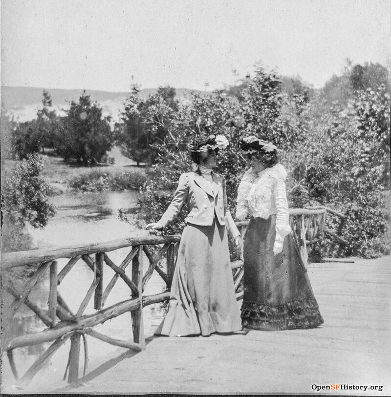North Lake, Chain of Lakes, Rustic Bridge, Two women posing on high bridge to island on North Lake. c1900 opensfhistory wnp27.2851.jpg