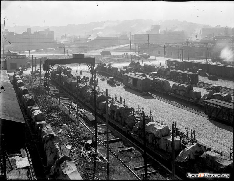 Ninth-&-Brannan-circa-1920-view-toward-the-south-of-the-Western-Pacific-Railyard,-Pacific-Portland-Cement-Company-at-the-corner-of-9th-and-Brannan-(building-still-stands)-Potrero-Hill-rising-in--wnp30.jpg