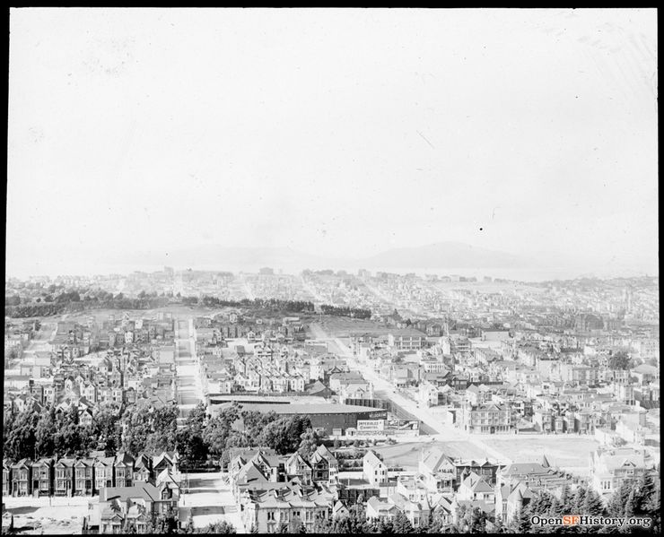 File:C1902 Golden Gate Park Panhandle and The Velodrome in foreground, on the site of the Southern Pacific Hospital at Baker and Fell. In the background is Calvary Cemetery. Part of a Panorama From Buena Vista Park wnp13.032.jpg
